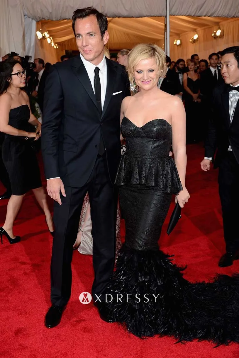 Amy Poehler black strapless peplum dress at 2012 Met Ball Amy Poehler black strapless peplum dress at 2012 Met Ball