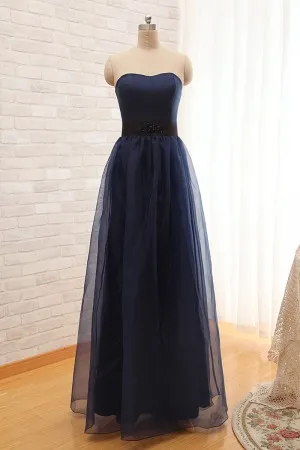 sheer tulle overlay navy strapless bridesmaid gown