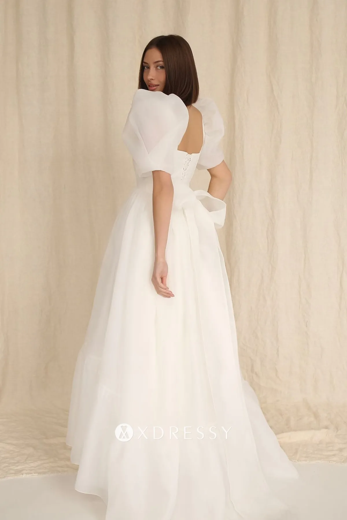 cute organza bridal dress with bow at back