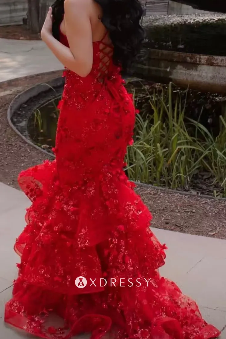 red ruffled mermaid prom dress with lace up back