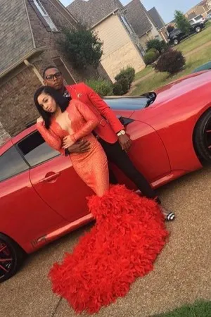 plunging neck feather long train red prom dress