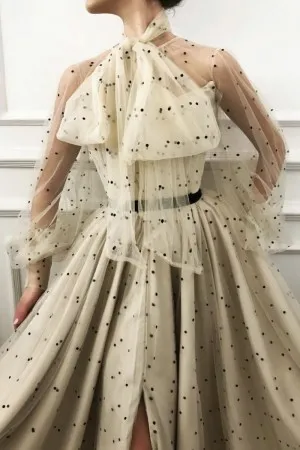 black polka dot sheer long sleeve slit formal gown