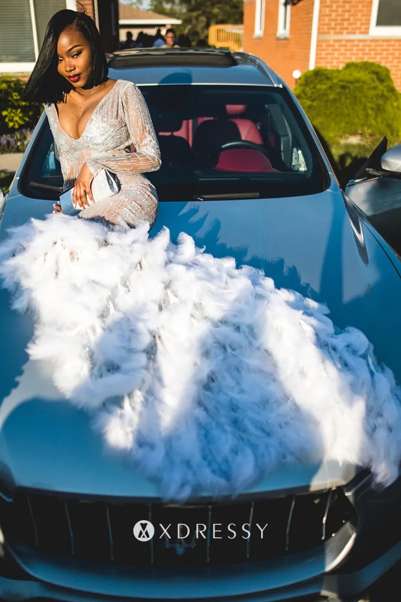long sleeve white sequin nude lining feather train prom dress