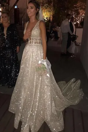 plunging neck ivory glitter sleeveless prom dress