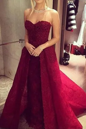 dark red lace strapless sheath overskirt prom gown