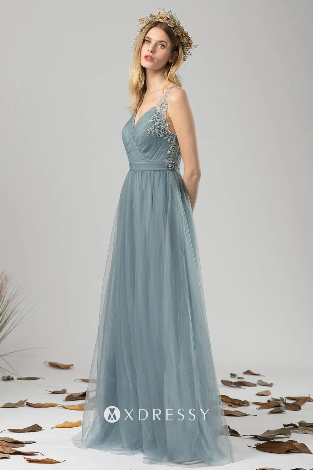 dusty blue sleeveless floor length wedding guest gown