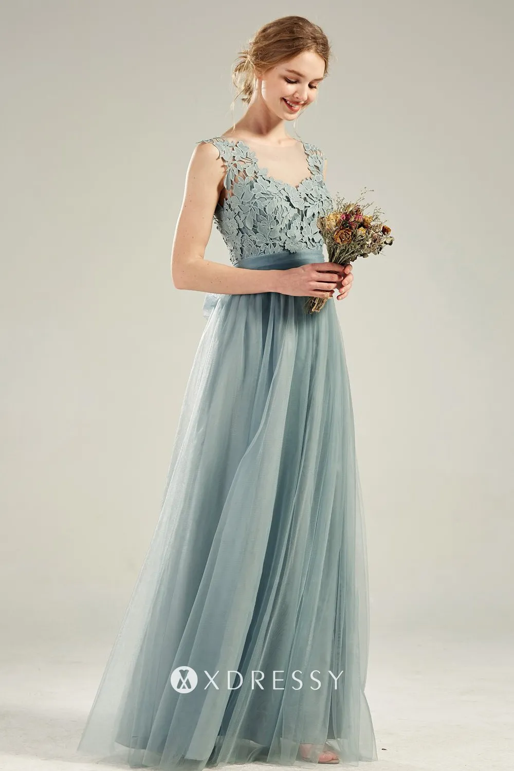 floor length dusty blue wedding guest gown