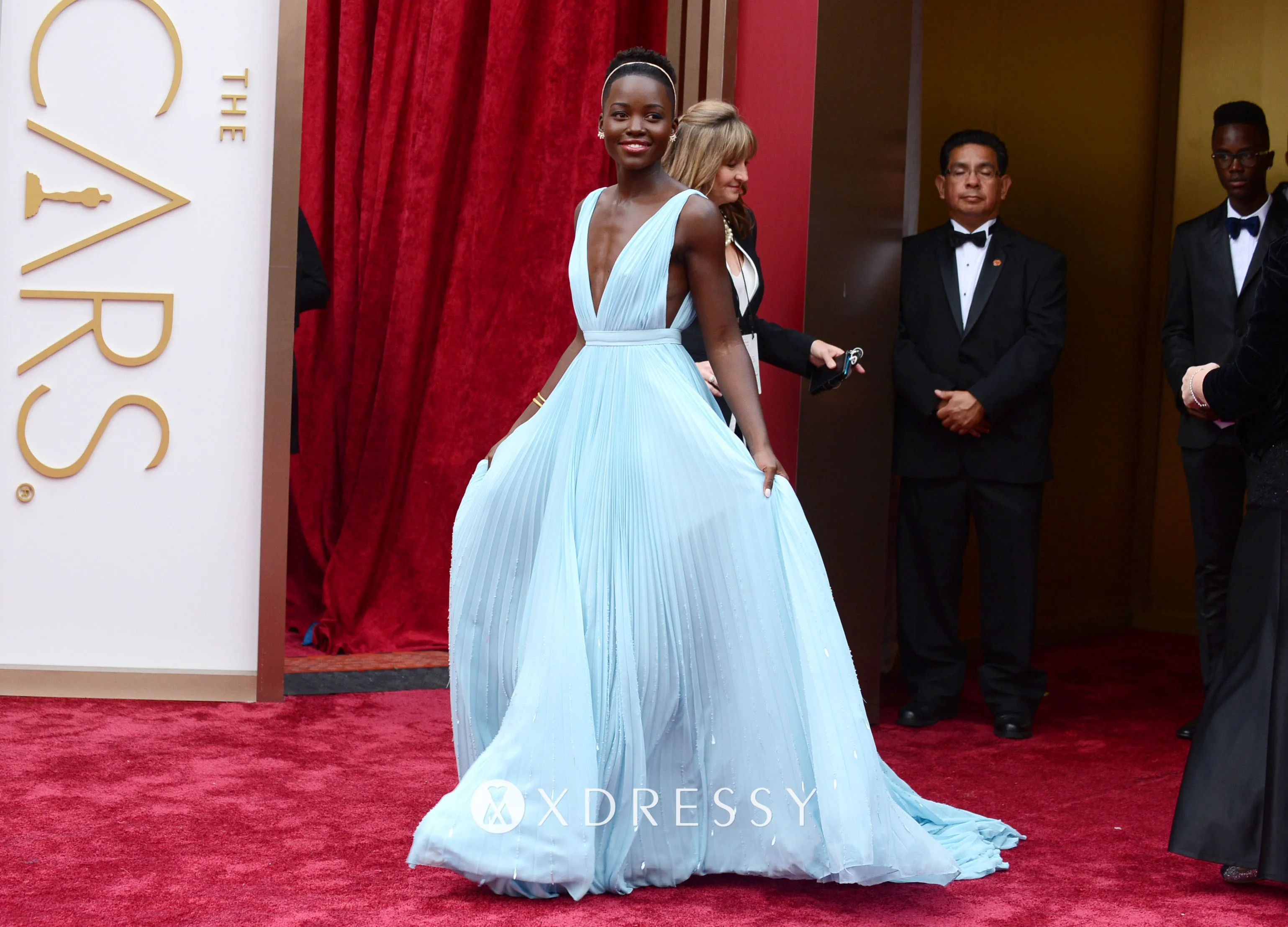 Lupita Nyongo light blue pleated chiffon red carpet dress Lupita Nyongo light blue pleated chiffon red carpet dress