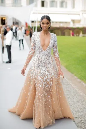 Chanel Iman white lace appliqued champagne tulle red carpet dress in amfARs 22nd Cinema Against AIDS Gala 2015