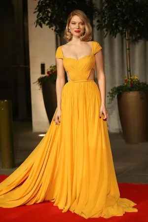 Lea Seydoux yellow chiffon red carpet dress at BAFTA Awards 2015