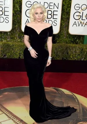 Lady Gaga black velvet red carpet dress at Golden Globes 2016