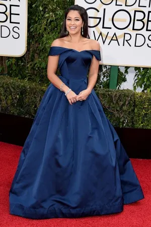 Gina Rodriguez navy blue satin red carpet dress at Golden Globes 2016