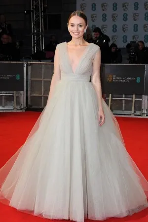 Laura Haddock steel gray tulle red carpet dress at 2015 BAFTA