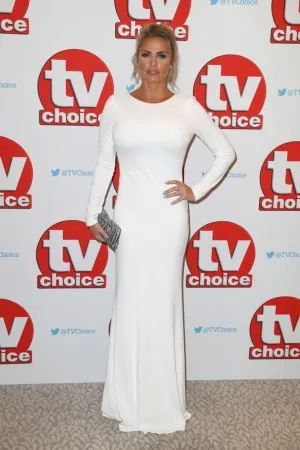 Katie Price pure white jersey red carpet dres at TV Choice Awards 2016
