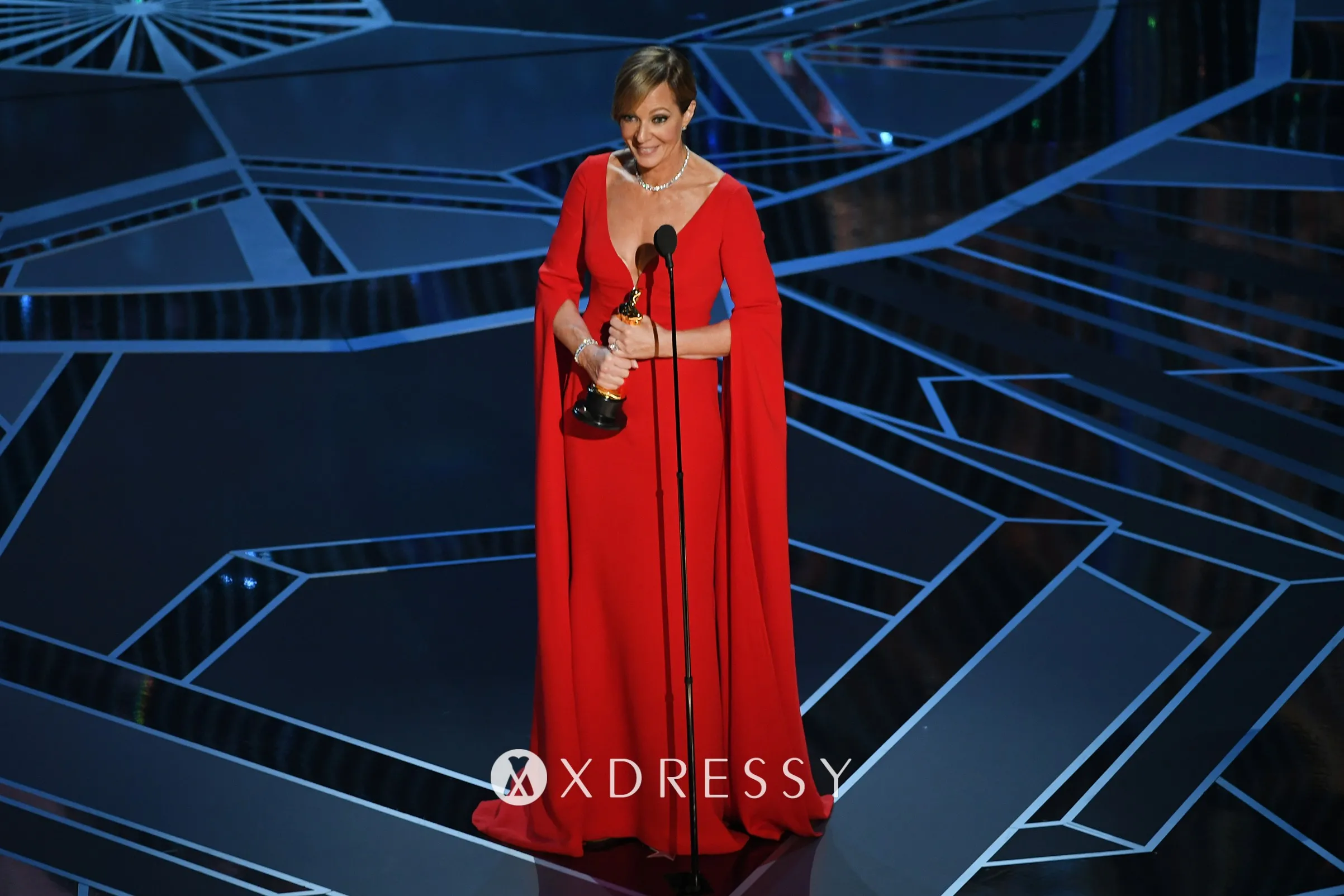 Allison Janney long sleeve red evening dress