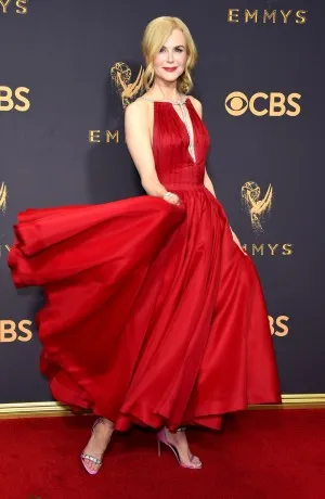Nicole Kidman red satin tea length red carpet dress at Emmys 2017