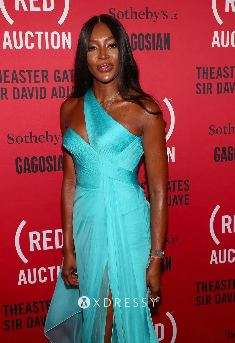 Naomi Campbell turquoise one shoulder red carpet gown at RED Auction 2018