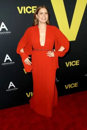 Amy Adams looked ravishing in a red chiffon gown at Vice Premiere in Beverly Hills 2018