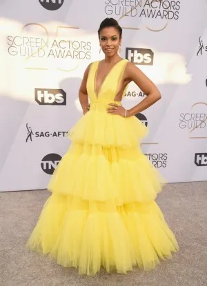 Susan Kelechi Watson tiered yellow tulle plunging V neck dress at the 2019 SAG Awards red carpet