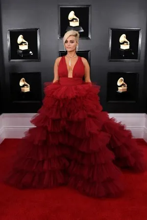 Bebe Rexha tiered ruffled burgundy tulle gown 2019 Grammy Awards red carpet