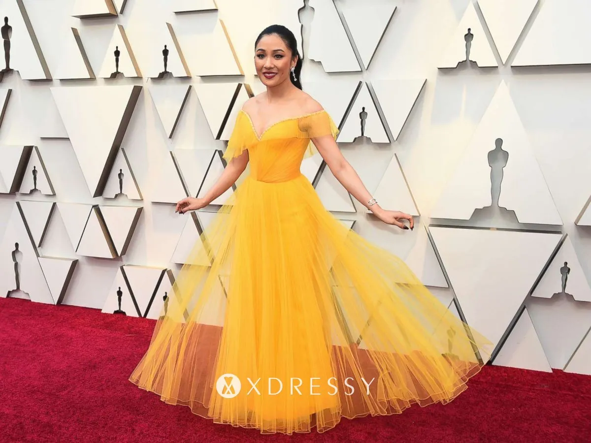 Constance Wu off the shoulder marigold formal dress 2019 Oscars red carpet Constance Wu off the shoulder marigold formal dress 2019 Oscars red carpet