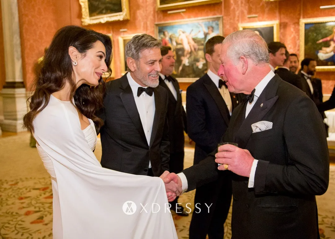 Amal Clooney white one sleeve caped evening dress Amal Clooney white one sleeve caped evening dress