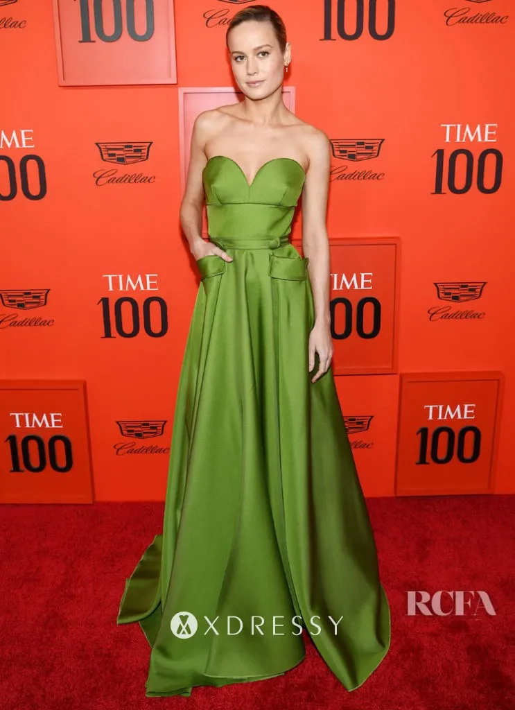 Brie Larson strapless sweetheart olive green formal dress with pockets at the 2019 Time 100 Gala red carpet