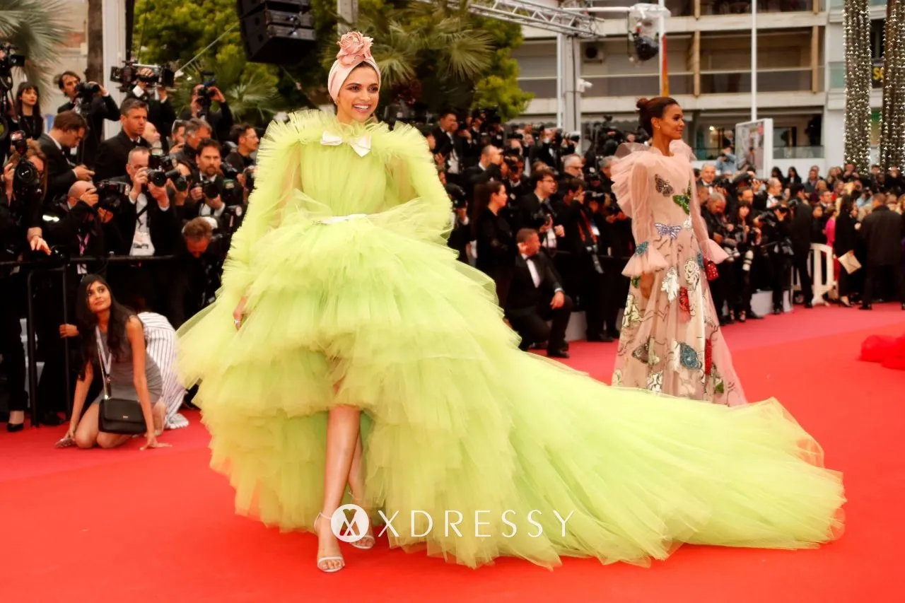 Deepika Padukone lemon green ruffled tulle high low red carpet dress with long train Deepika Padukone lemon green ruffled tulle high low red carpet dress with long train