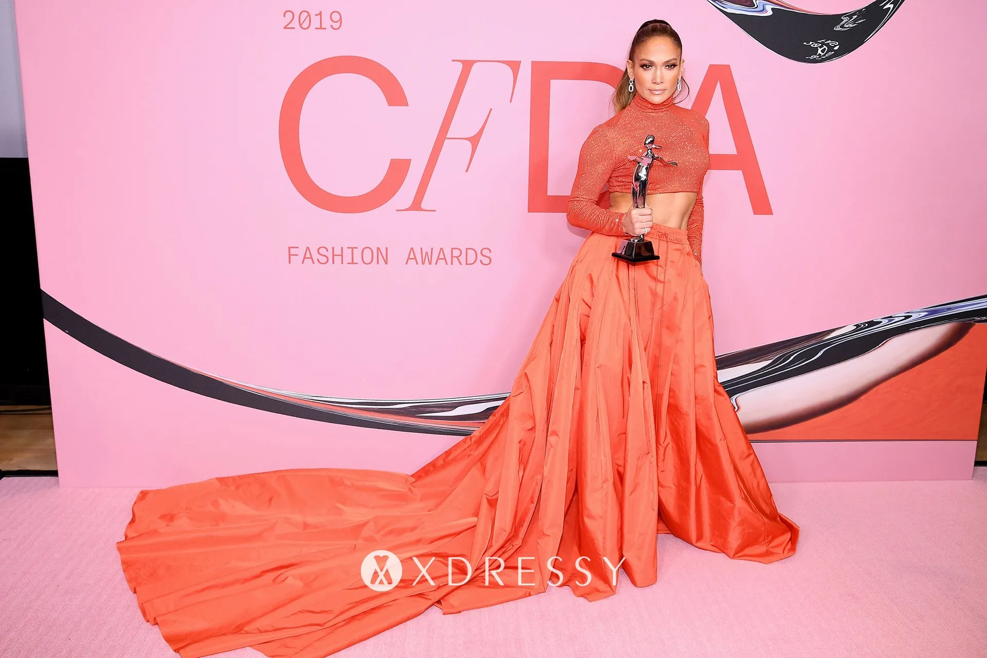 Jennifer Lopez orange glitter and taffeta long train red carpet prom dress