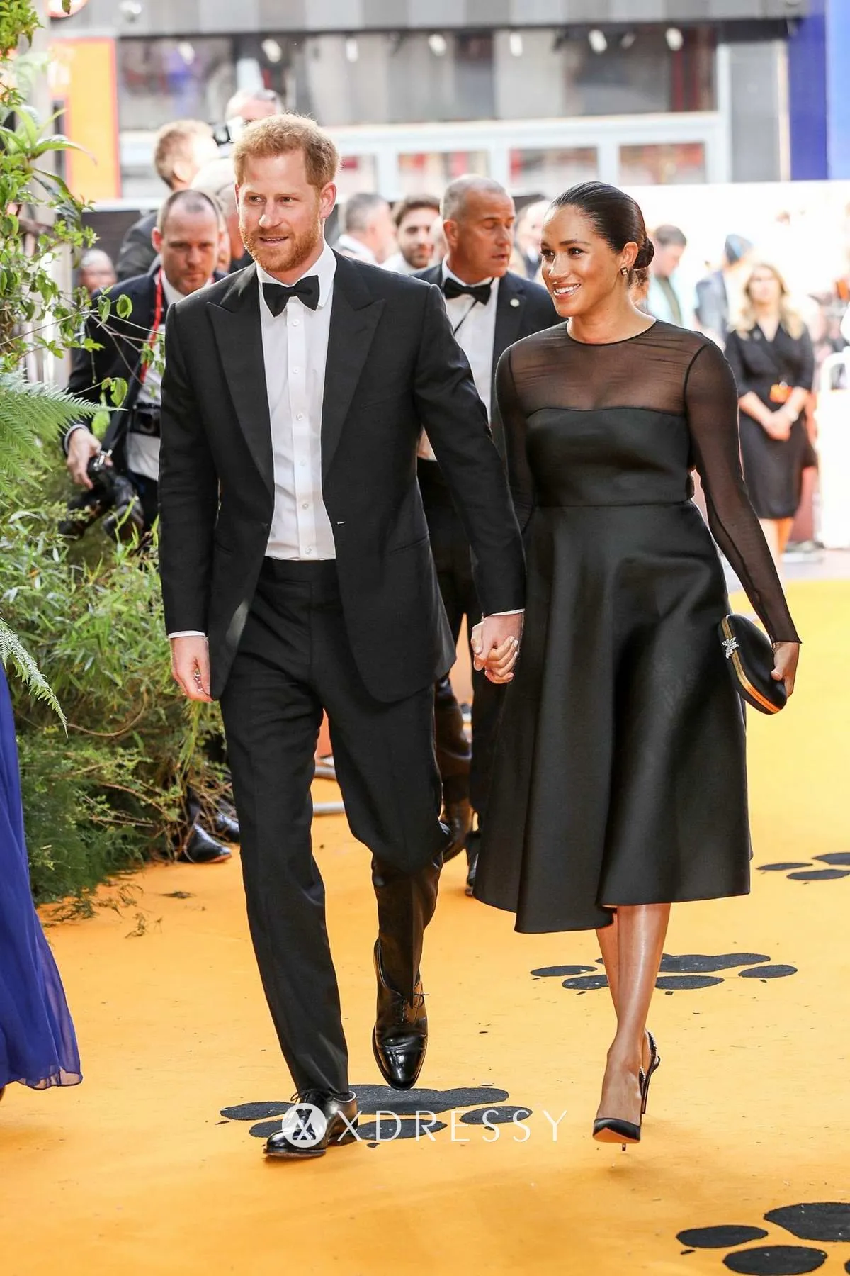 Meghan Markle elegant little black satin celebrity dress at the European premiere of The Lion King Meghan Markle elegant little black satin celebrity dress at the European premiere of The Lion King