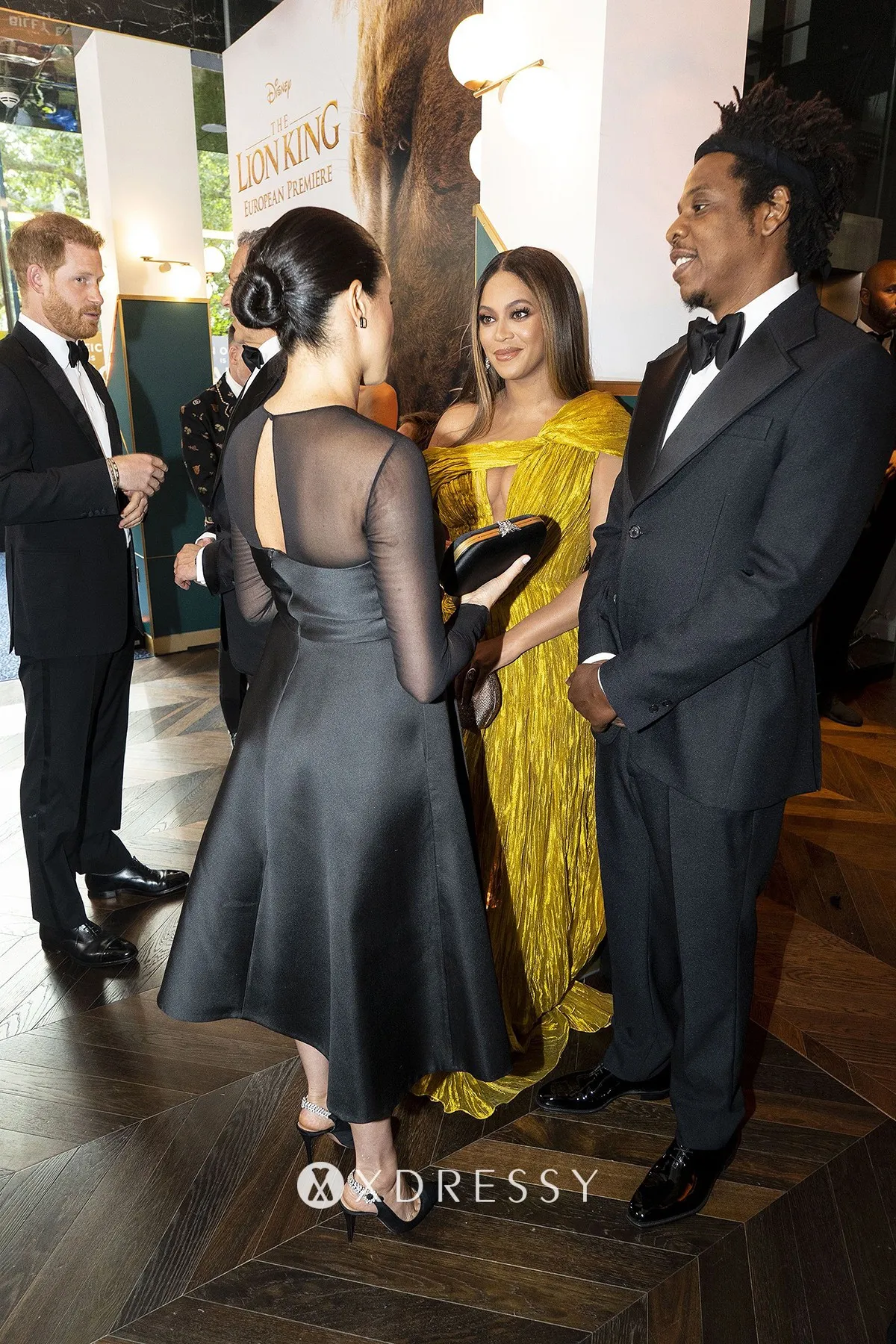 Meghan Markle looked elegant in a mesh panel little black dress with long sleeves at the premiere of The Lion King Meghan Markle looked elegant in a mesh panel little black dress with long sleeves at the premiere of The Lion King