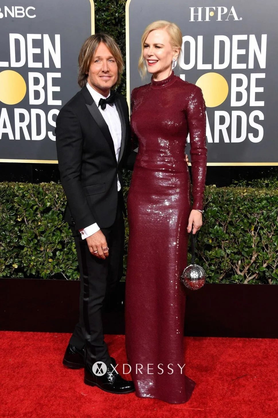 Nicole Kidman in a long column burgundy sequin high neck formal gown on 2019 Golden Globes red carpet