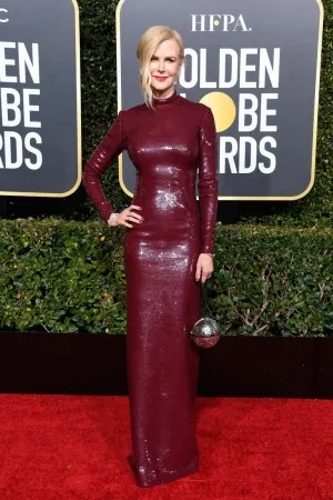 Nicole Kidman long column burgundy sequin high neck formal gown with long sleeves on 2019 Golden Globes red carpet