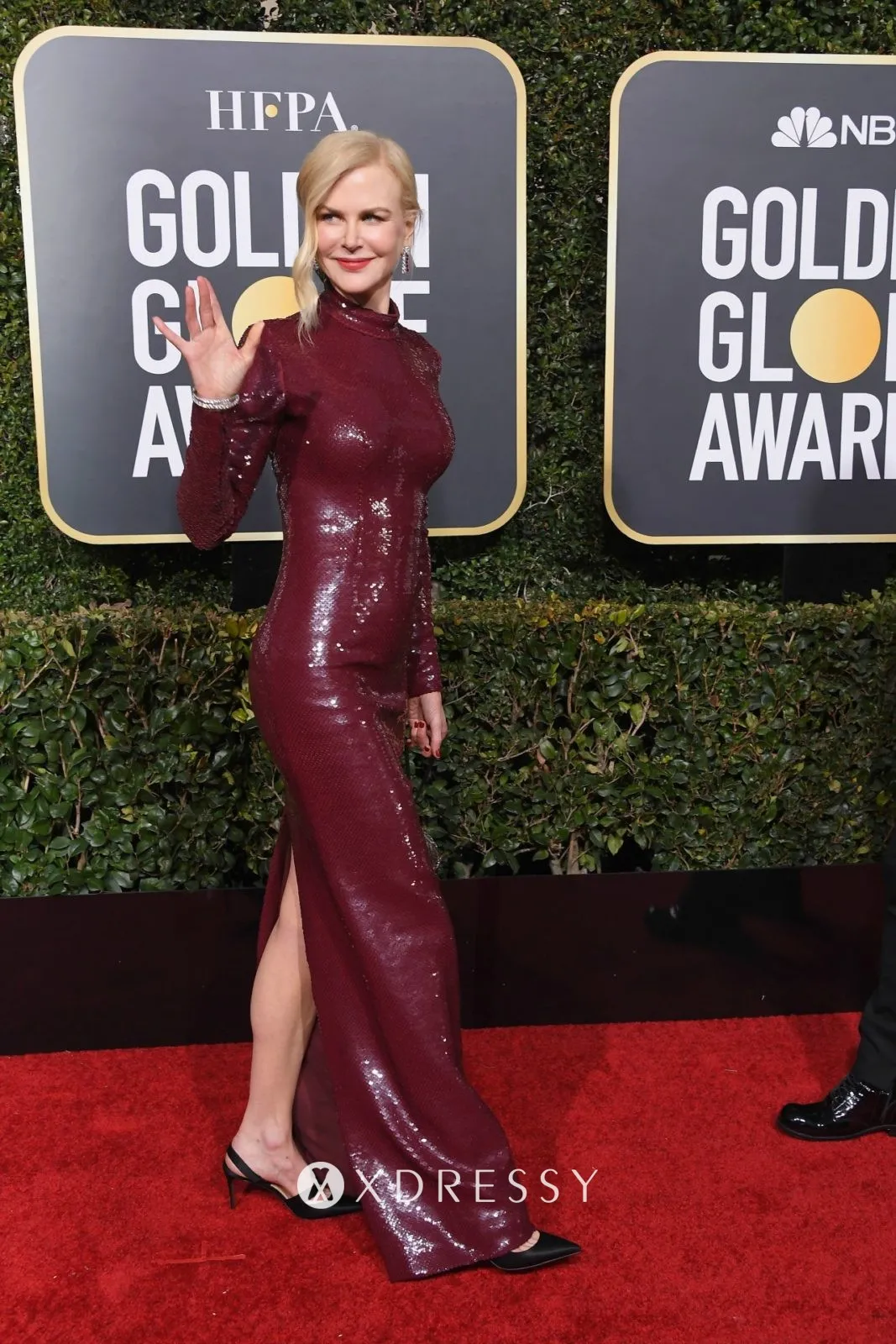 Nicole Kidman looked absolutely breathtaking in the long column burgundy sequin high neck formal gown