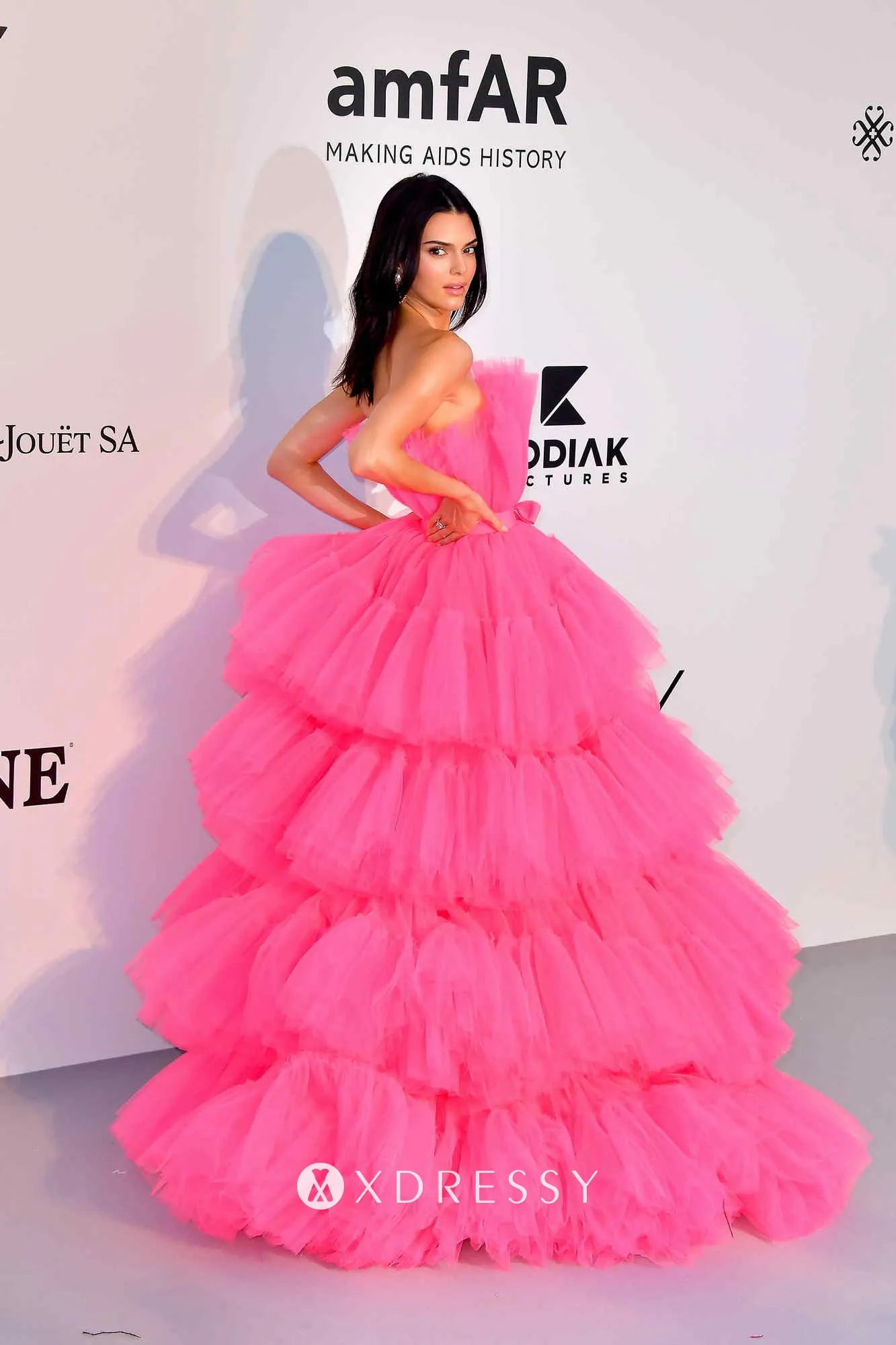 Kendall Jenner in a pink voluminous tiered tulle prom gown for the amfAR Gala 2019 Kendall Jenner in a pink voluminous tiered tulle prom gown for the amfAR Gala 2019