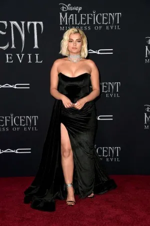 Bebe Rexha slit floor length black velvet simple dress at the world premiere of Maleficent Mistress of Evil