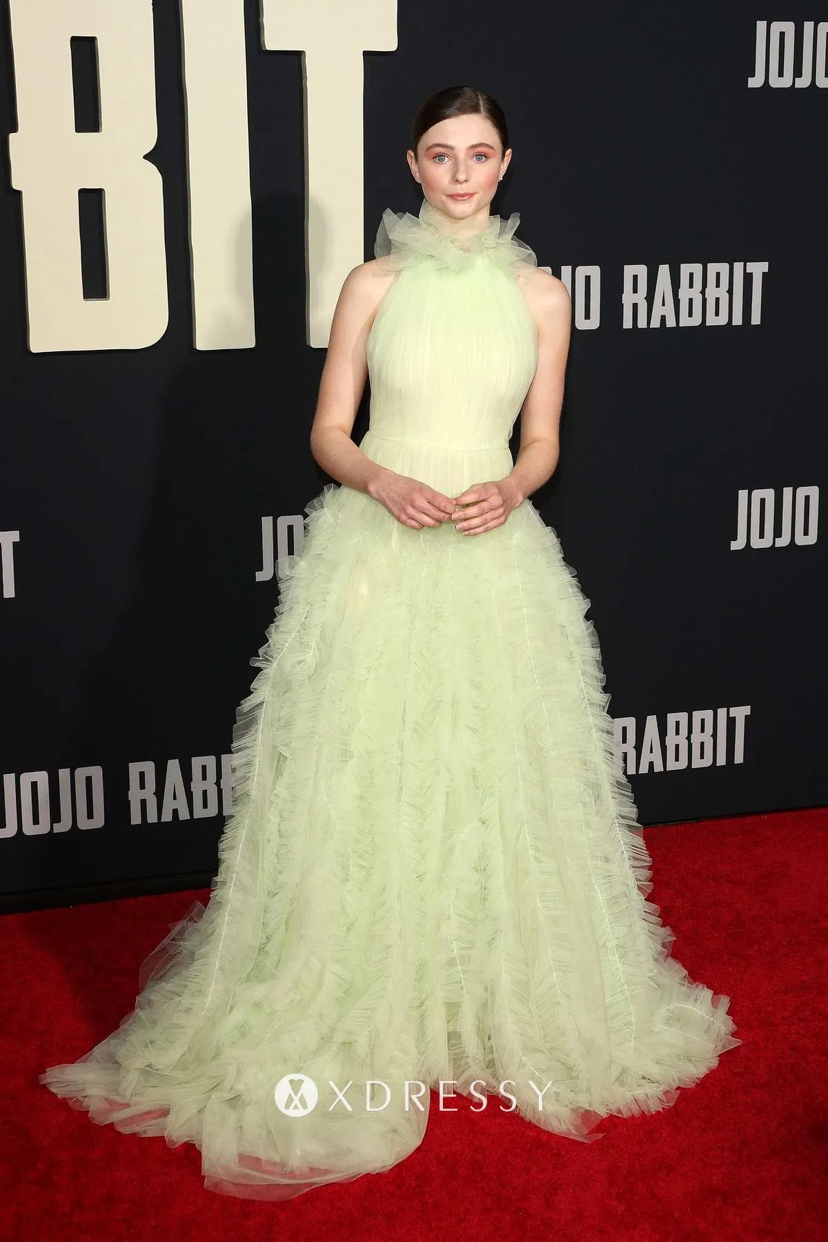 Thomasin McKenzie ruffled sage green tulle halter formal dress at premiere of Jojo Rabbit 2019 red carpet Thomasin McKenzie ruffled sage green tulle halter formal dress at premiere of Jojo Rabbit 2019 red carpet