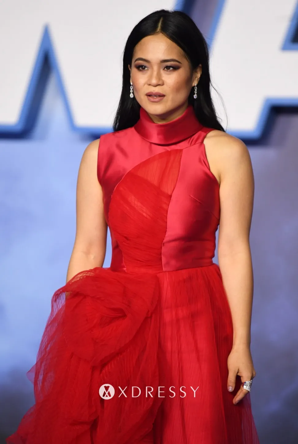 Kelly Marie Tran looked striking in a high neck red satin and tulle gown Kelly Marie Tran looked striking in a high neck red satin and tulle gown