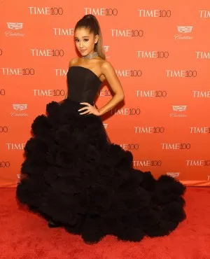 Ariana Grande went high glam for the 2016 Time 100 Gala featuring a black ruffled long train formal dress