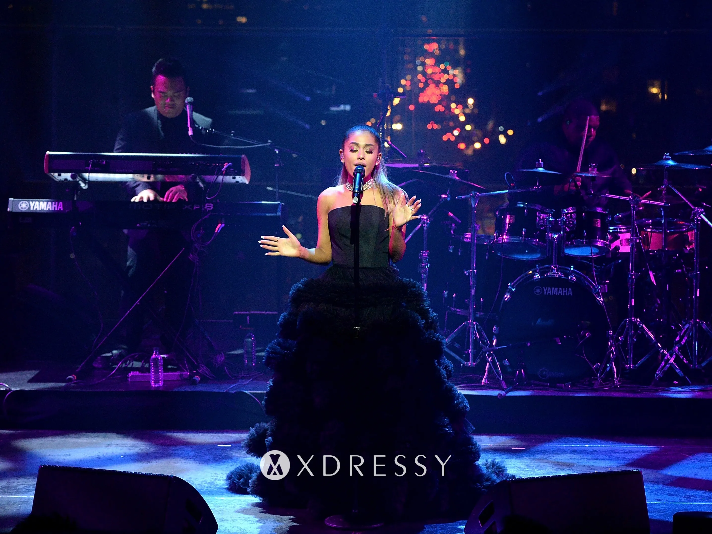 Ariana Grande went high glam for the 2016 Time 100 Gala featuring a black satin and tulle strapless ruffled dress