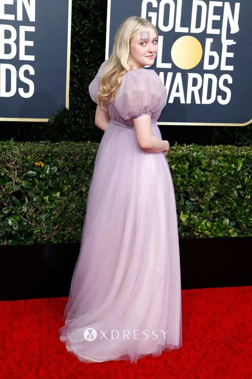 Dakota Fanning in a lilac tulle empire waist cute evening prom gown at the 2020 Golden Globes red carpet