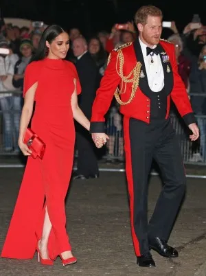 Meghan Markle looked downright regal in a scarlet column formal dress at the Mountbatten Music Festival 2020