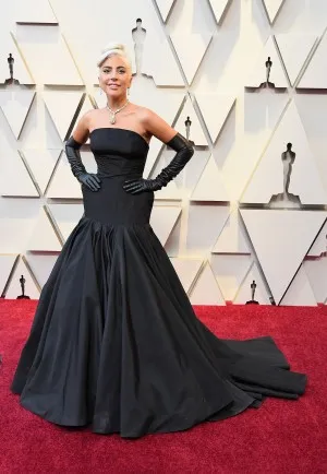 Lady Gaga strapless black satin gown at Oscars 2019 red carpet