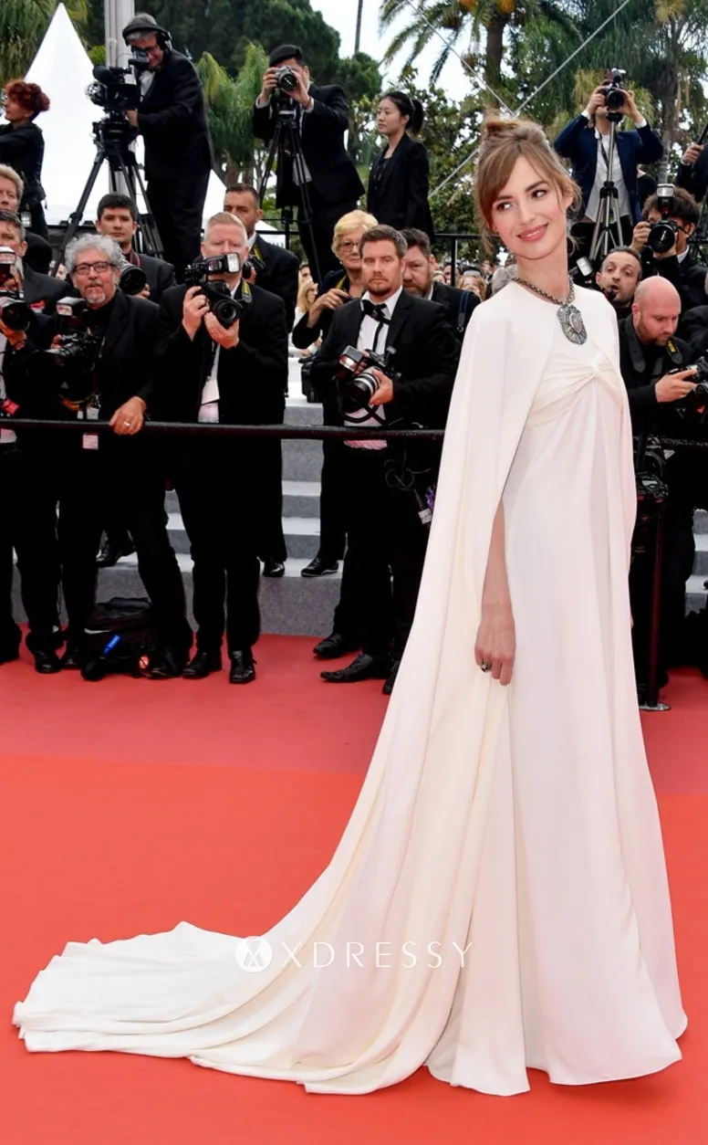 Louise Bourgoin white caped formal dress on the red carpet
