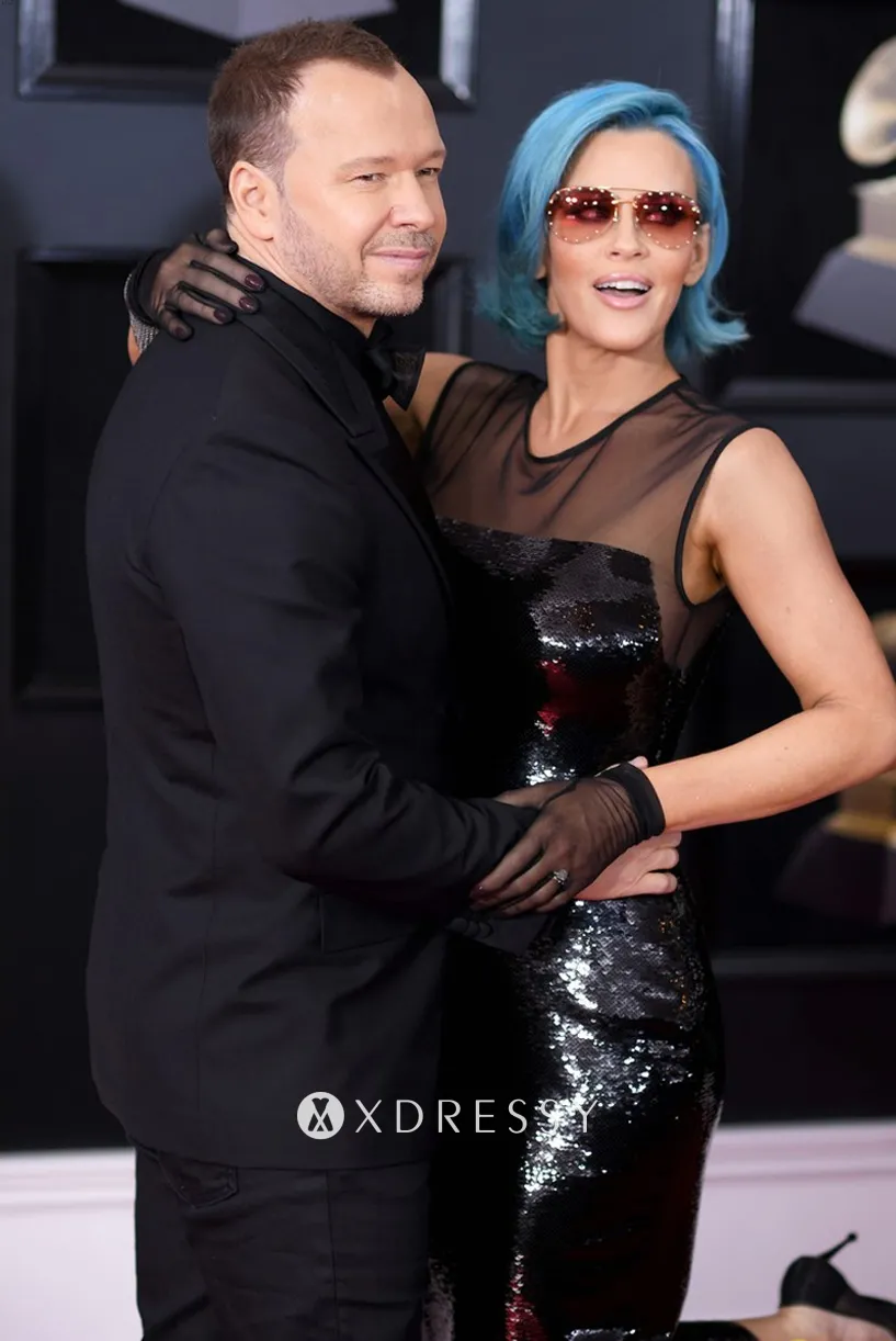 Jenny McCarthy black sequin sheer neck evening dress