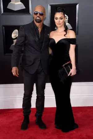Lina Esco black velvet off shoulder mermaid evening formal dress at the 2018 Grammys