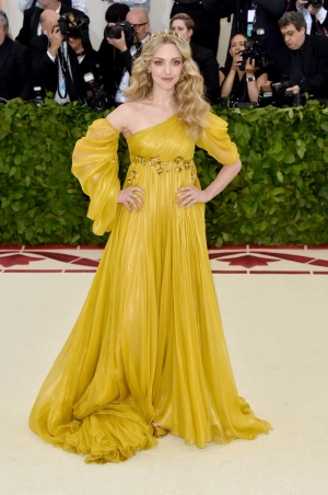 Amanda Seyfried 2018 Met Gala mustard yellow prom dress