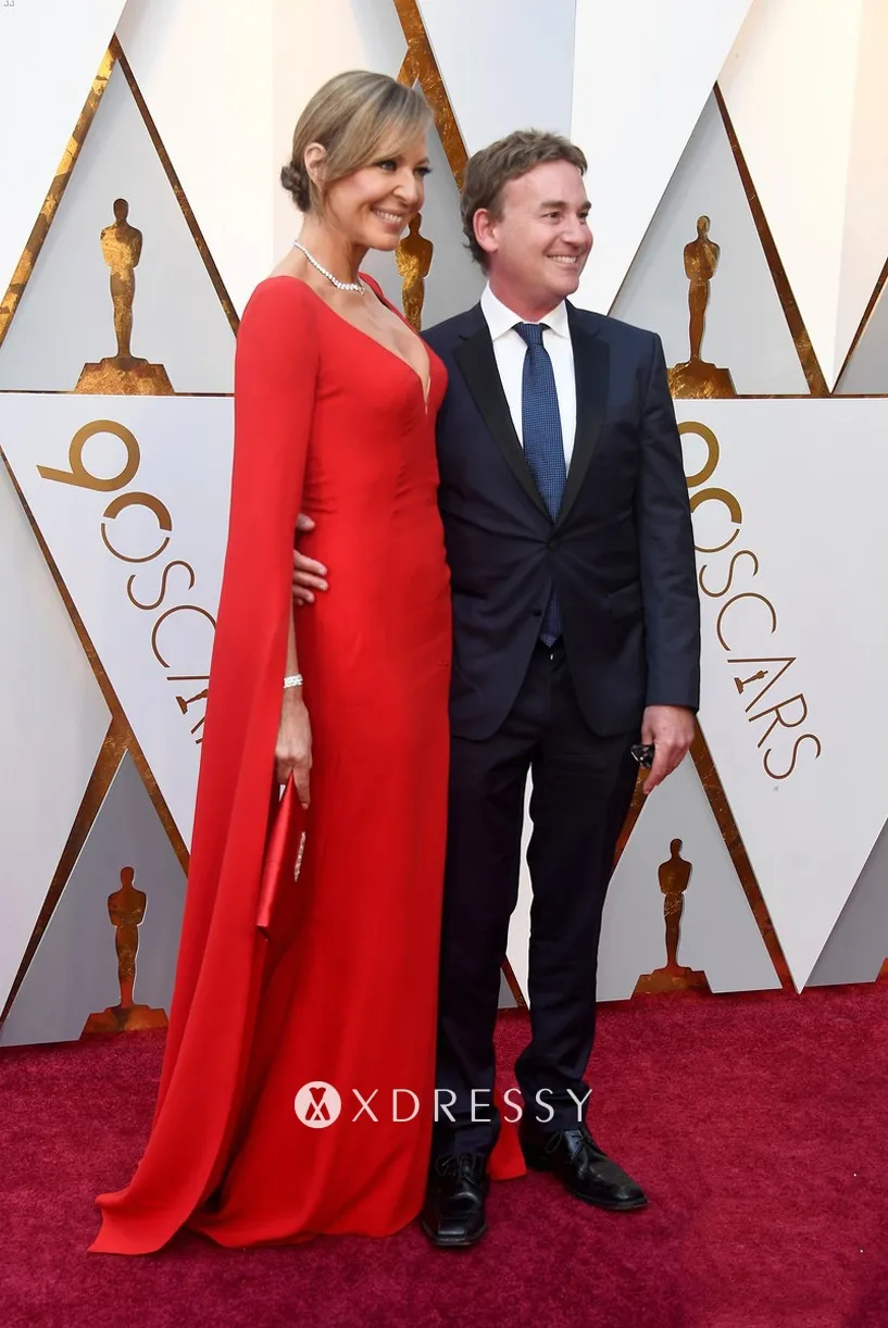 Allison Janney red sheath dress with exaggerated sleeves Allison Janney red sheath dress with exaggerated sleeves
