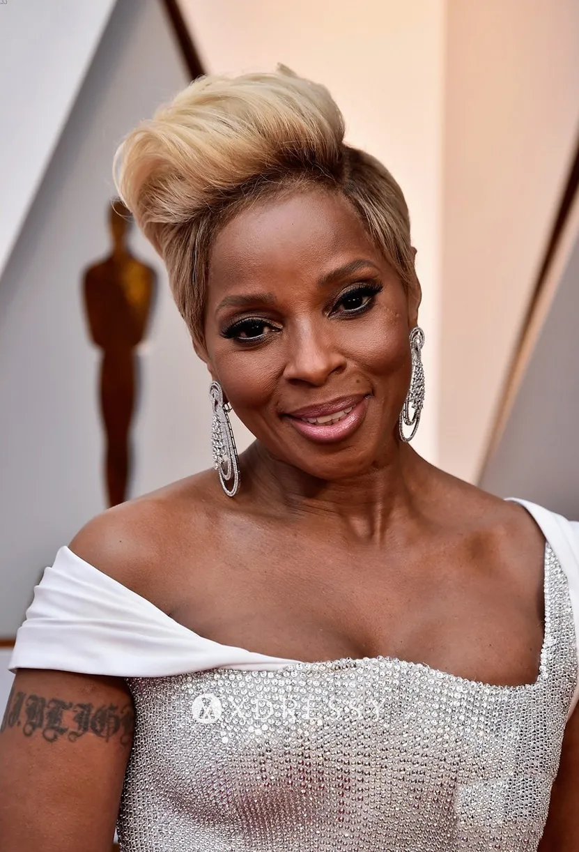 Mary J Blige asymmetrical neckline beading dress