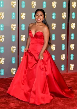 Yalitza Aparicio red satin gown 2019 BAFTAs